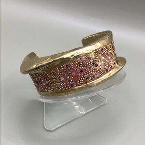 Brushed gold tone asymetric dazzling sparkling crystals dressy statement cuff.